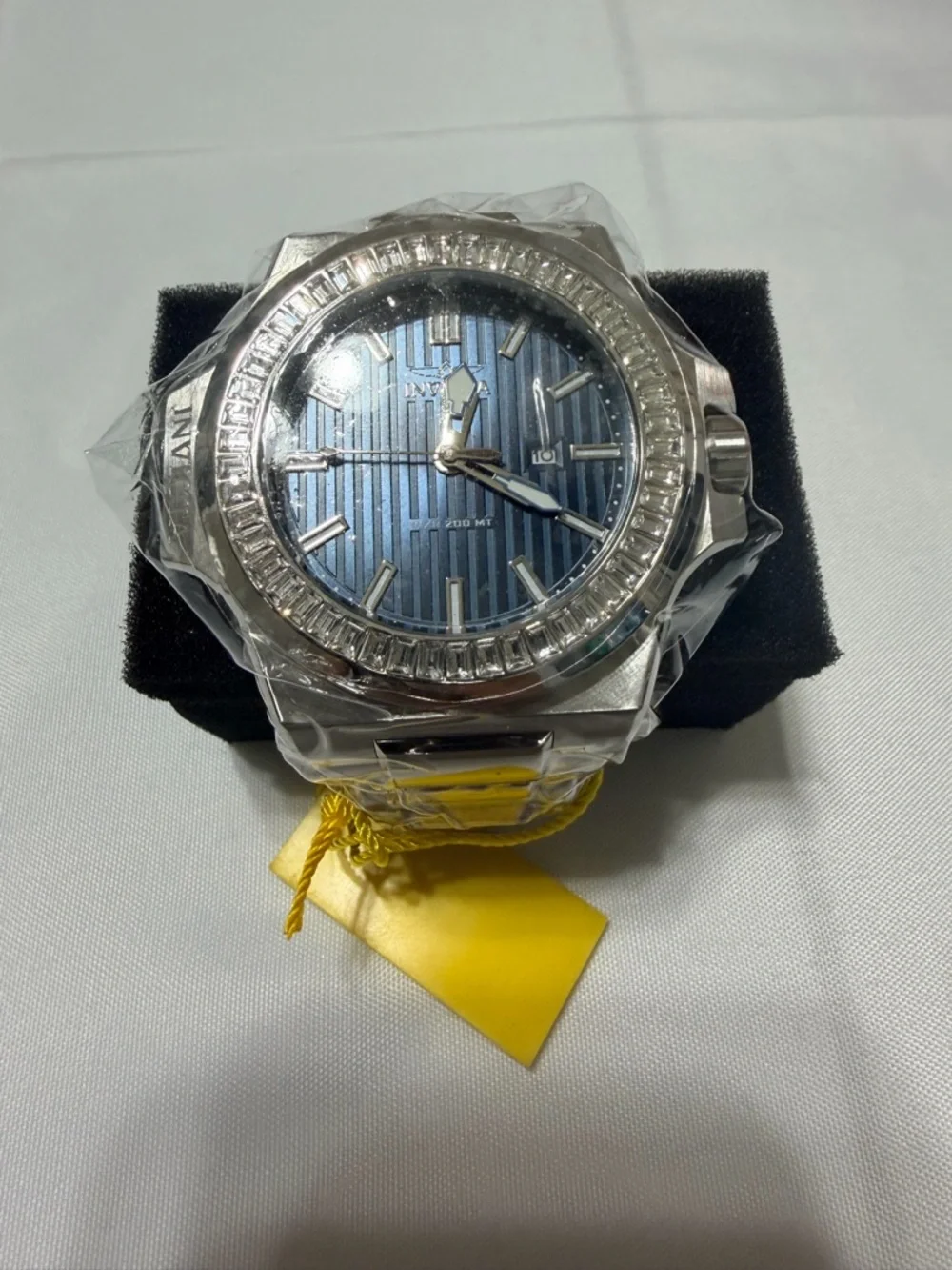 Invicta Men’s Akula 58mm silver watch with silver bracelet.